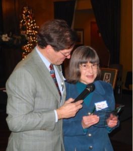 Marilyn Logue accepts the Carol Logue Award
