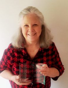 Genie Hoster receives the 2017 Carol Logue Bibliographic Fellowship Award